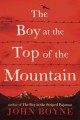 The boy at the top of the mountain  Cover Image